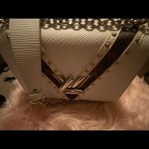 Epi leather brown and white twist lock